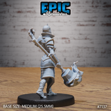 Female undead warrior queen seen from behind, armoured back and pauldrons visible, gripping a large flaming maul across her body with one arm raised. Bandage-wrapped lower legs and bare feet visible. Sculpt by Epic Miniatures.