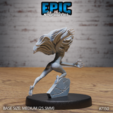 Undead female figure leaning forward in a running lunge, one clawed hand raised at chest height, long flowing hair sweeping dramatically behind her head, standing on a fractured flat stone base. Sculpt by Epic Miniatures.