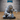 Crouching robed creature with a single large eye set in an iron-rimmed socket, gripping a hooked serrated blade, beside a small cylindrical object. Sculpt by Epic Miniatures.