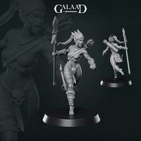 Digital render of an unpainted grey resin Amazon warrior miniature at 32mm scale, shown in a dynamic mid-charge pose with one knee raised. She carries a long spear in her forward hand, wears tribal armour with bracer wrappings, a feathered helmet crest, a skull-adorned shield strapped to her leg, and a back-mounted quiver of arrows. Two angles are shown — a front three-quarter view and a rear three-quarter view — both on round black bases. Galaad Miniatures logo visible in the top corner.