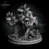 Side-angle digital render of the Hydra Bloom miniature — upright lunging pose with one raised toothed flower-head reaching forward and a second open maw visible at centre, root and vine body texture clearly detailed, unpainted grey resin