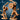Two unpainted resin minotaur miniatures from La Louve 3D shown side by side against a blue background — both posed dynamically mid-charge with spiked mauls raised overhead and wooden round shields on their arms, mounted on sculpted tree-root bases; the larger foreground figure shows pronounced musculature and bull horns in detail