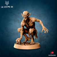 Unpainted resin miniature of a feral crouching vampire by La Louve 3D, shown in a warm tan resin colour. The figure is lean and snarling, with pointed ears, sunken eyes, and clawed hands. One hand grips a skull on a cobblestone base while the other reaches forward aggressively. Printed at 32mm scale by Mitz and Simz.