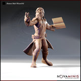 32mm scale digital render of an unpainted Human Male Wizard miniature, variation 02 by Novaminis — a bearded wild-haired man mid-stride with one hand raised in a spellcasting gesture and an open spellbook held in the other, wearing a split travelling coat, studded boots, and a belt hung with pouches