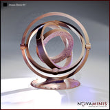 Digital render of the Novaminis Arcane Device 01 — a gyroscopic arcane instrument with three interlocking concentric rings on a riveted circular base, the innermost ring featuring scrollwork and sigil engravings, rendered in a warm copper tone.