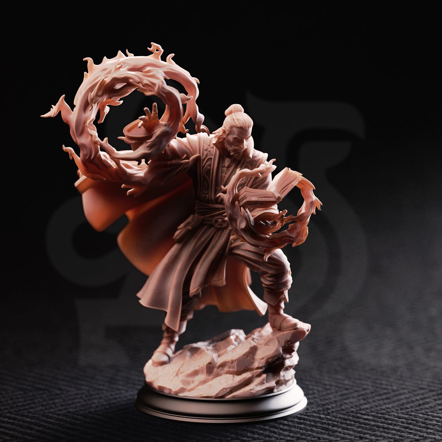 Photograph of the printed Aaron Drafthold Wandering Mage miniature, unpainted, showing the front — dynamic pose with spellbook in hand, fire arc sweeping around him, rocky terrain base, mounted on a display plinth
