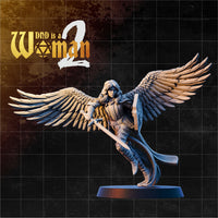 Winged female warrior in mid-stance, sweeping a long halberd forward with both hands. Large feathered wings spread wide. Fitted plate armour with a flowing coat and long loose hair. Plain round base. Sculpt by DnD is a Woman.