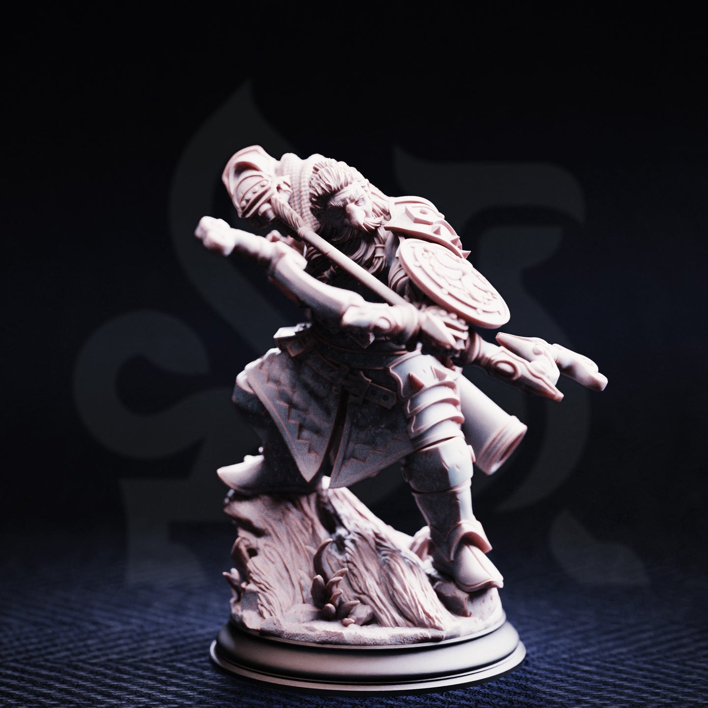 Unpainted grey resin miniature of Achtum of the Meadow, dwarven ranger, photographed from the front — showing crossbow, ornate round shield, layered armour including pauldrons and greaves, and a detailed textured base with foliage and rocky terrain