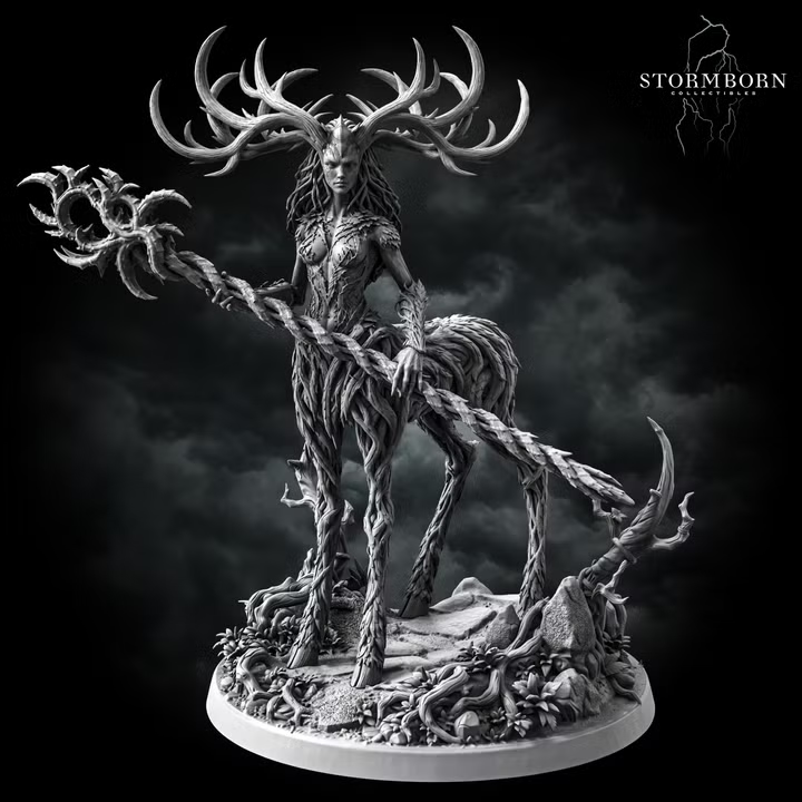 Aldara by Stormborn Collectibles — antlered fey figure formed from twisted bark and roots, holding a thorned staff outward, standing on a detailed base of exposed roots and cracked stone.