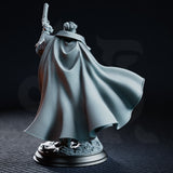 Male investigator figure in layered armour and a long coat with skull-decorated pauldrons and belt, holding a flintlock aloft, on a debris-covered scenic base. Sculpt by DM Stash.