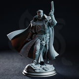 Grim male inquisitor raising a flintlock pistol overhead, wearing a billowing coat adorned with skull medallions, standing on a rubble-strewn base. Sculpt by DM Stash.