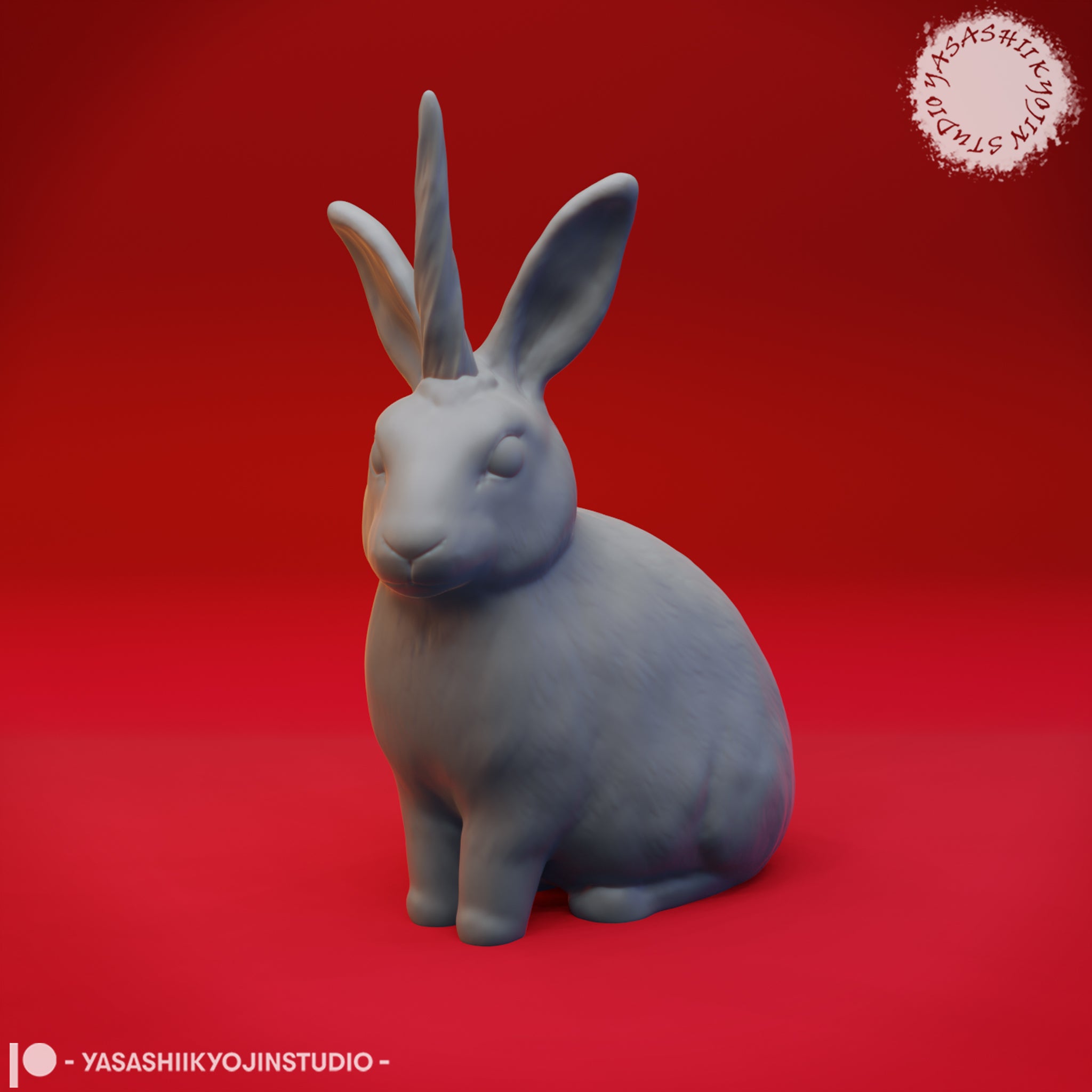 Close-up digital render of the jackalope miniature variant — a seated rabbit with small antler-like horns between its ears, unpainted grey sculpt, shown in detail against a red background by Yasashii Kyojin Studio