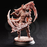 Front view of an unpainted salmon-pink resin miniature of a heavily armoured warrior construct mid-stride, wielding two large serrated scythe-axes swept wide, wearing ornate scale armour with a masked helm and a tattered cape, mounted on a sculpted cobblestone base with a display plinth