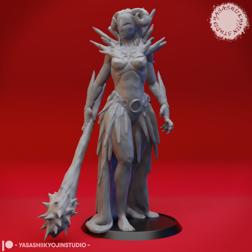 Front view of an unpainted grey resin miniature of a horned female figure standing on a round black base, holding a large spiked mace trailing behind her right hand, with a jagged bone-shard collar around her shoulders and a feathered skirt — 32mm scale tabletop miniature by Yasashii Kyojin Studio