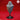 Digital render of the Auril 03 miniature by Yasashii Kyojin Studio — an unpainted grey low-poly geometric owl spirit figure mounted on a slim black display base, shown against a deep red background