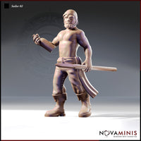 Front view of Sailor 02 miniature by Novaminis — a bare-chested bearded male sailor in a cloth headband and laced leather trousers, holding a bottle in one hand and a hooked boarding spear across his body, rendered in unpainted tan resin at 32mm scale