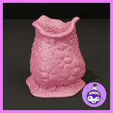 Unpainted pink resin barrel mushroom miniature with textured leathery body, angled hollow opening at the top, and thin worm-like roots spreading across the base — 32mm scale scatter terrain