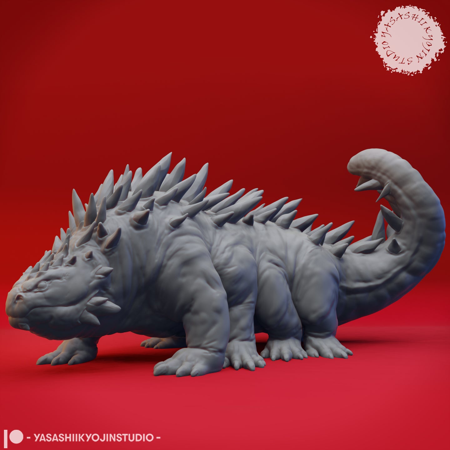 Grey unpainted resin digital render of a basilisk miniature by Yasashii Kyojin Studio, shown in profile view with spined dorsal ridge running from neck to curled tail, broad armoured body, and four clawed feet, against a red background