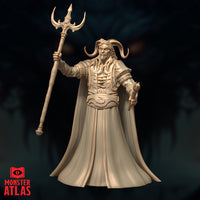 Unpainted resin miniature of Belial the Archdevil by Monster Atlas — a horned, bearded figure in layered armour and a sweeping cloak, raising a trident-staff to one side with one hand while holding a short sceptre in the other. Render shown in warm tan against a dark background.