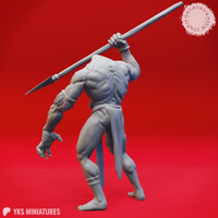 Rear three-quarter view of the same unpainted grey resin Blemmye miniature, showing the broad muscled back, the dramatic overhead arc of the spear, bound wrist cuffs, and wide throwing stance with clawed feet planted on the ground