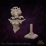 Disassembled display bust showing the Queen of Shattered Reflection torso piece and the separate tiered pedestal with square post, both unpainted. Scrollwork detail visible across the rear armour panel. By Great Grimoire.