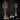 Unpainted resin renders of the Gothic Candelabra Set by Mia Kay M3DM — showing three terrain pieces: a tall skull-medallion candelabra with hanging chains, a slender variant candelabra, and a small melted-candle cluster base, all in warm beige resin against a dark stone background