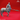 Muscular centaur miniature gripping a long spear at waist height, three-quarter angle, with long swept-back hair, heavy-featured face, layered cloth kilt, and detailed equine haunches. Sculpt by Yasashii Kyojin Studios.