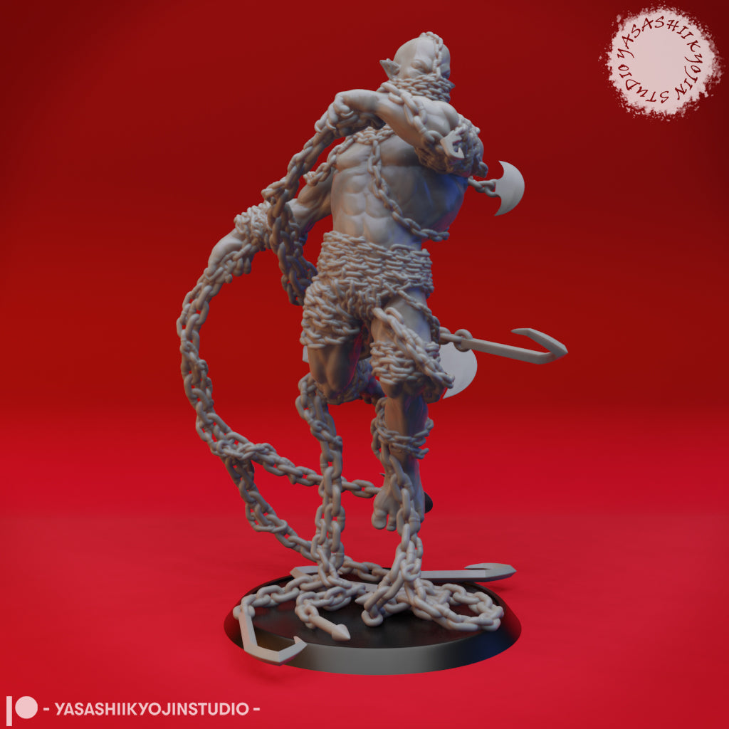 Grey resin render of a Chain Devil miniature from Yasashii Kyojin Studio — a muscular fiend wreathed in heavy iron chains, holding a crescent axe, with chains sweeping outward and meat hooks scattered across the round base