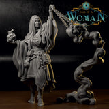 Grey resin print of Changeling Cleric Rin — long-haired cloaked figure with prayer beads at the belt, kindling sacred flame in one hand and swinging a heavy chain censer in the other, smoke column beside her.