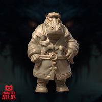 Front-facing hippofolk miniature showing a wide-set stance in laced boots, bulky trench coat with deep fabric folds, and a steampunk device cradled in both hands. Sculpt by Monster Atlas.