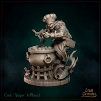 Skeletal chef miniature leaning over an iron cauldron, wearing a tall toque, holding a dripping ladle, with a cleaver at his hip and ghostly flames beneath the pot. Sculpt by Great Grimoire.