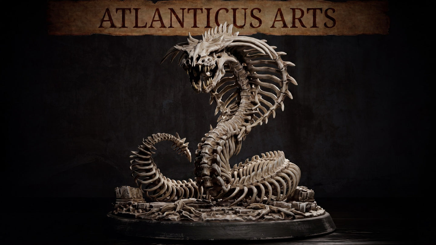 Bone Naga skeletal serpent miniature by Atlanticus Arts, rearing upright with wide-flared ribcage hood and snarling draconic skull, coiled body resting on a bone-and-rubble scenic base.