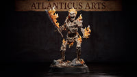 Flaming skeleton miniature advancing with a broadsword raised, fire erupting from skull, elbows, and shins, standing on a bone-strewn base with small ground flames. Sculpt by Atlanticus Arts.