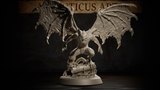 Winged Vampire Lord crouching with arms outstretched and mouth open in a snarl, standing atop a shattered coffin base with cracked stonework and root tendrils. Sculpt by Atlanticus Arts.