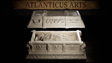 Vampire coffin terrain piece by Atlanticus Arts: ornate open casket with reclining robed figure inside, gargoyle corner mounts, scrollwork base panels, and separate decorated lid displayed behind.