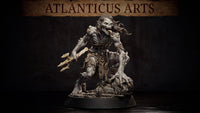 Lacedon Ghoul miniature by Atlanticus Arts: emaciated undead creature lunging forward, wielding a jagged bone weapon, mouth agape in a snarl, wild hair streaming back, standing on a debris-strewn scenic base.