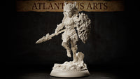 Dryad Warrior by Atlanticus Arts: bark-armoured female figure mid-stride, thorn-tipped spear extended forward, large gnarled wood shield on her left arm, wild branching hair, standing on a sculpted tree-stump root base.