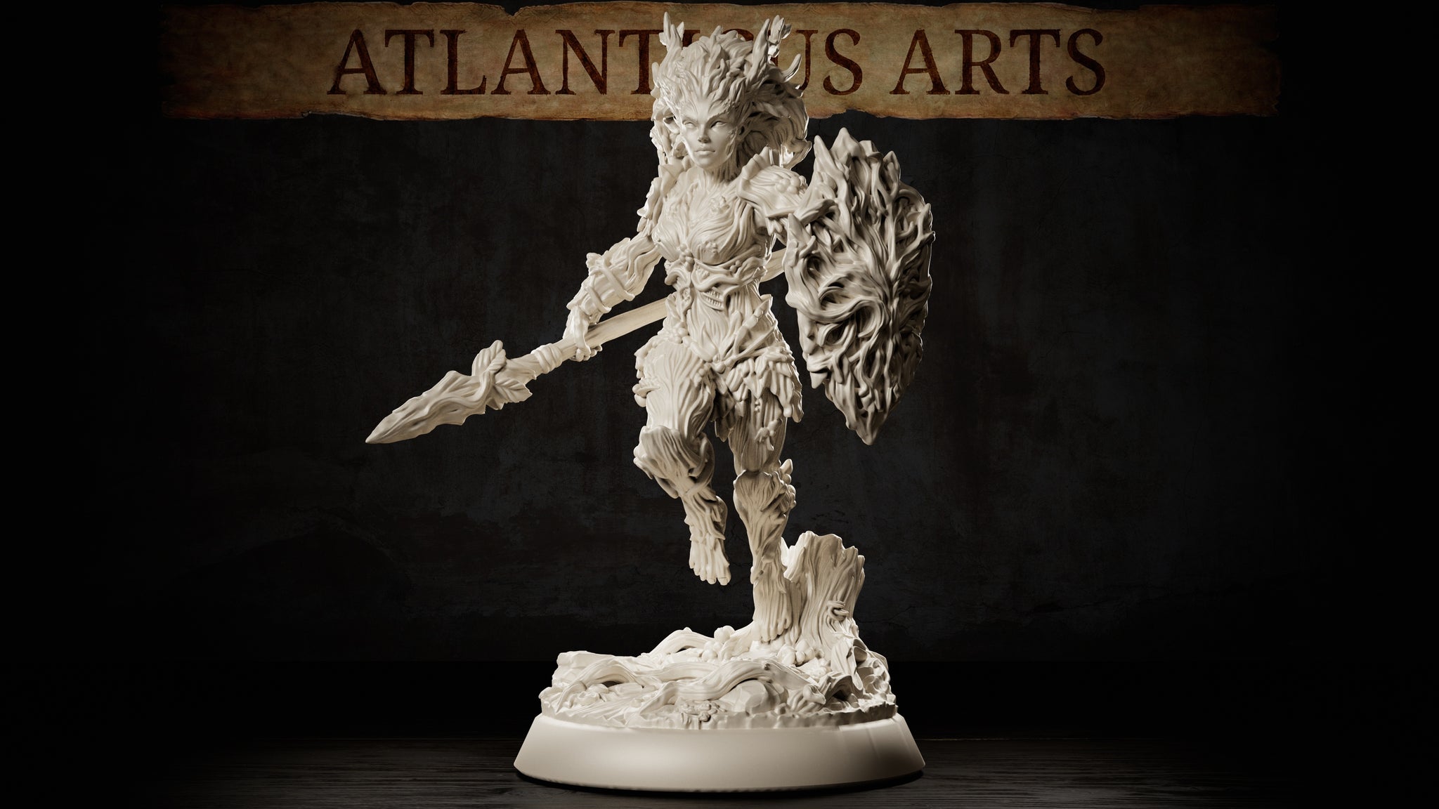 Dryad Warrior by Atlanticus Arts: bark-armoured female figure mid-stride, thorn-tipped spear extended forward, large gnarled wood shield on her left arm, wild branching hair, standing on a sculpted tree-stump root base.
