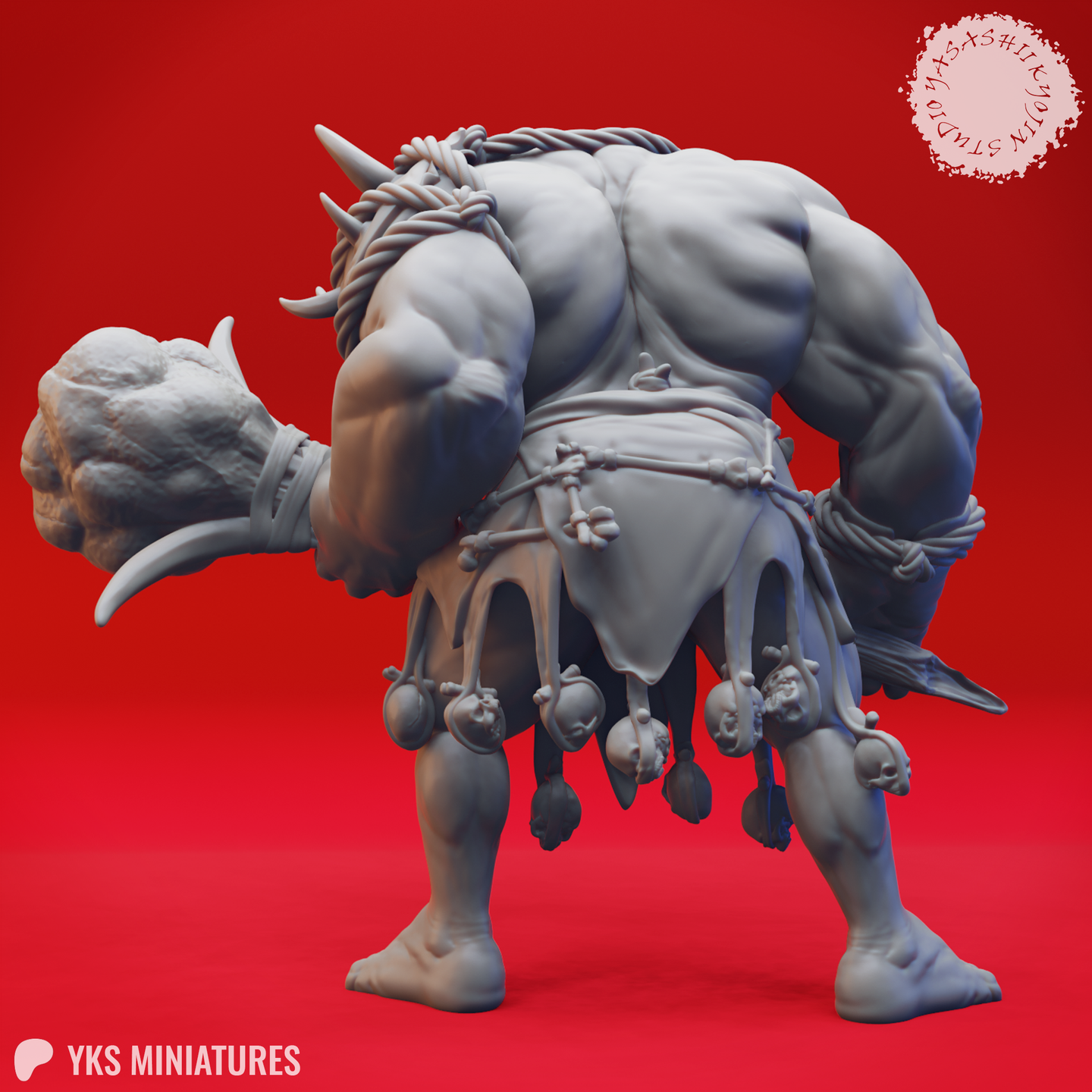 Rear three-quarter view of the same unpainted grey resin cyclops miniature, showing the broad muscular back, rope-bound spine, curved horns lashed across the shoulders, and the skull-studded stone maul visible at left. Trophy skulls and carved bone decorations hang from the rope loincloth belt. Digital render by Yasashii Kyojin Studios.
