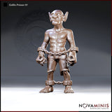 Muscular shackled goblin standing upright, wrists bound by a heavy chain between metal manacles, wearing ragged breeches with ankle shackles. Large pointed ears, heavy brow, blank pale eyes. Sculpt by Novaminis.