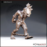 Muscular goblin with mohawk and ankle chain, wrists in manacles, hunched forward with a scowling expression, wearing cross-laced leather breeches. Sculpt by Novaminis.