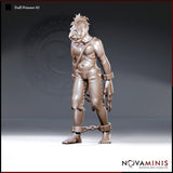 Shackled troll standing upright with iron cuffs on wrists and ankles, a chain looped between its feet, a rope collar across its shoulders, clawed hands hanging loose, snarling expression. Sculpt by Novaminis.
