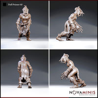 Chained troll prisoner crouching low, head angled down with a calculating expression, clawed hands spread wide, leather-wrapped forearms and lower legs. Sculpt by Novaminis.
