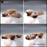 Four-angle digital render of Novaminis Supplies 04 scatter terrain set showing the fruit barrel, bread bowl, and bottle crate from multiple viewpoints, highlighting the wood grain texture on the crate and riveted metalwork on the barrel, all unpainted resin