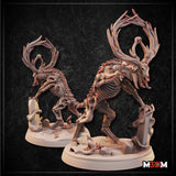 Two unpainted resin Deer Horror Full Corruption miniatures side by side — both skeletal deer creatures with gnarled antler crowns, exposed ribcages, and multiple snarling skulls at the shoulders; the left variant is smaller in a low stalking pose over graveyard stones, the right is larger and rearing upright with a clawed limb braced on a broken grave marker, scattered bones on both bases