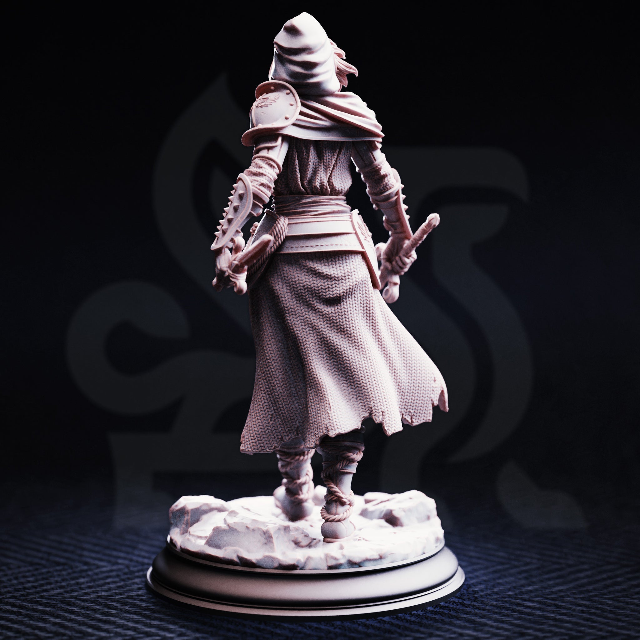 Rear view of the unpainted grey resin Delyna ro Unviel miniature on a round display base — revealing the textured chainmail hauberk, trailing torn skirts, rope-bound legs, spiked vambraces, devotional shield strapped to the belt, and the detailed sculpting on the rocky rubble base