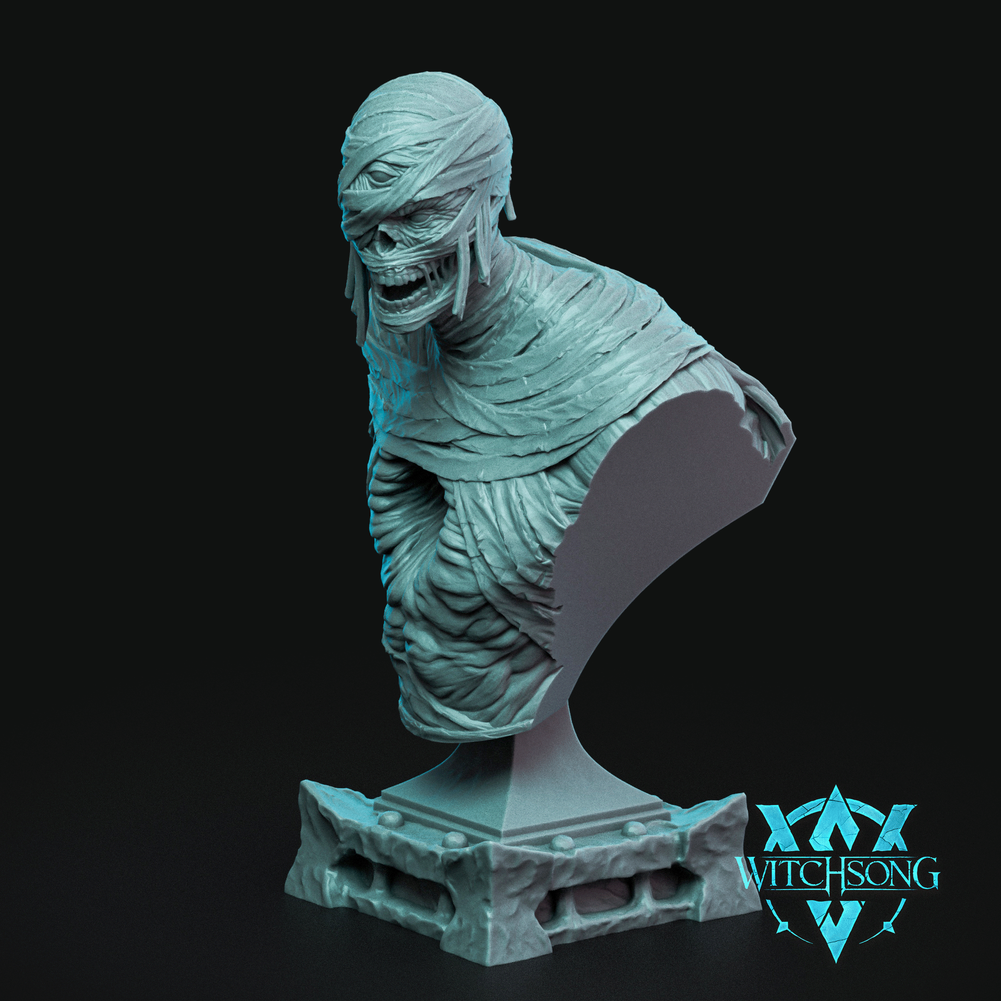 Unpainted resin display bust of the Desiccated Tyrant by Witchsong Miniatures — a mummy figure with layered decayed bandages, grimacing exposed jaw, half-visible sunken eyes, and a detailed stone plinth base, shown in grey resin against a black background