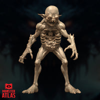 Devourer miniature by Monster Atlas — gaunt bipedal demon standing upright, arms wide, claws spread, with exposed ribs framing a screaming face set within its torso cavity.