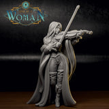Photograph of a printed Vincentia the Dhampir Bard miniature, front three-quarter view — unpainted grey resin showing fine surface detail on cloak, corset embroidery, and violin, 32mm scale tabletop miniature by DnD is a Woman