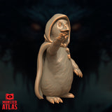 Dohwar Merchant miniature by Monster Atlas — close view of the raised clawed hand held near the open beak, deep hood framing wide round eyes, heavy fabric folds across the chest with gemstone and button details. Sculpt by Monster Atlas.